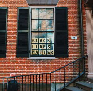 *Black Lives Matter* sign in window